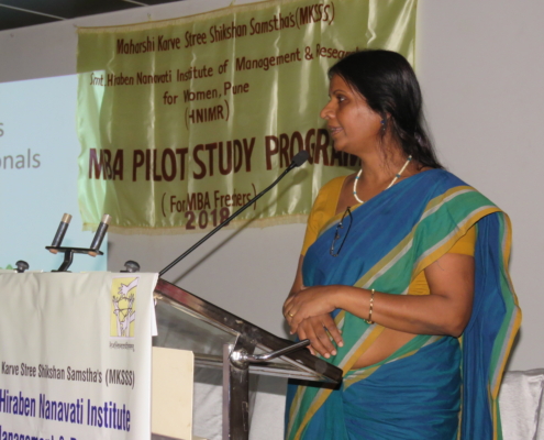 Dr. Meena Ganapati addressing audience in MBA Pilot Study Programme