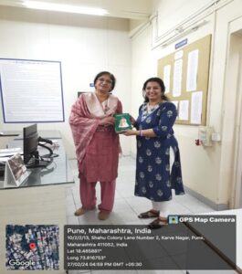 Director Dr. Surya Ramdas with Librarian Mrs. Manjushree Nawale in Library