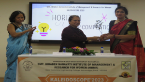 Director, HNIMR, Dr. Surya Ramdas Felicitating the Judge, Dr. Mamta Mishra.