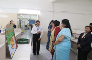 Students presenting their posters in front of the judges Dr. Deepa Sathe & CA. Prof. Sanu Purandare, Poster Presentation 21st October 2024, Day 2 Kaleidoscope 2024